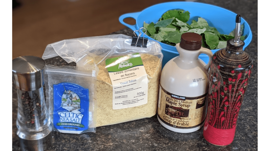 Ingredients to make crispy and cheesy kale chips in oven or dehydrator using nutritional yeast.