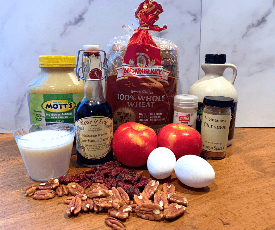 Simple ingredients for bread pudding with apples and cranberries