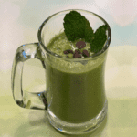This healthy green smoothie recipe perfectly balances spinach, parsley, and mint along with banana for a tasty shamrock shake.