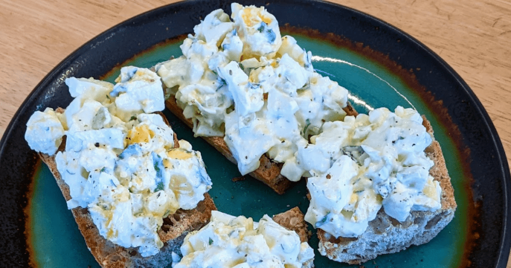 Open faced sandwich is a beautiful inviting presentation for this healthier egg salad recipe