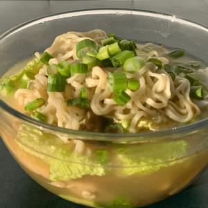 Ramen soup healthy upgrade with chicken, miso and fresh vegetables like a pho ramen bowl