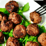 Keto cheese stuffed bison meatballs recipe includes meal prep tips on how long to airfry frozen meatballs.