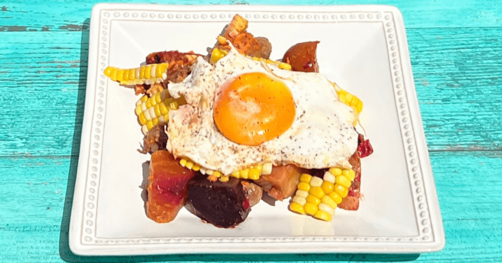 Beet breakfast hash with eggs, or some call it egg and beetroot hash.