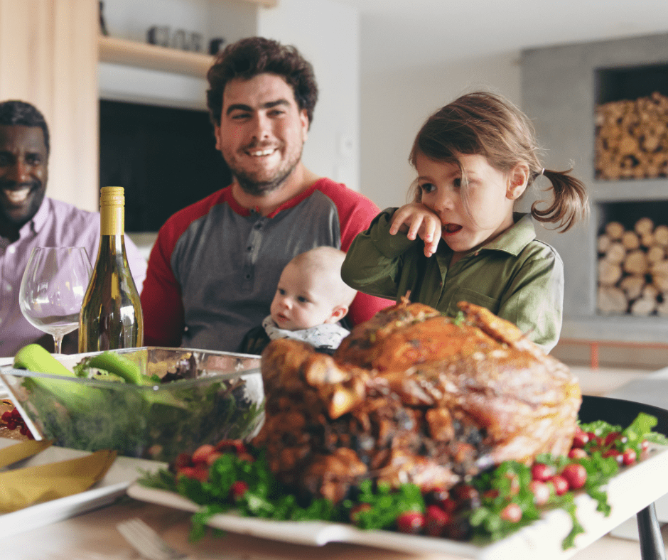 Tips for healthy Thanksgiving - family eating a stress free holiday meal together