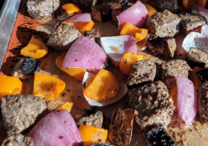 Taking beef brochettes off the grill and making it easy with this sheet pan recipe